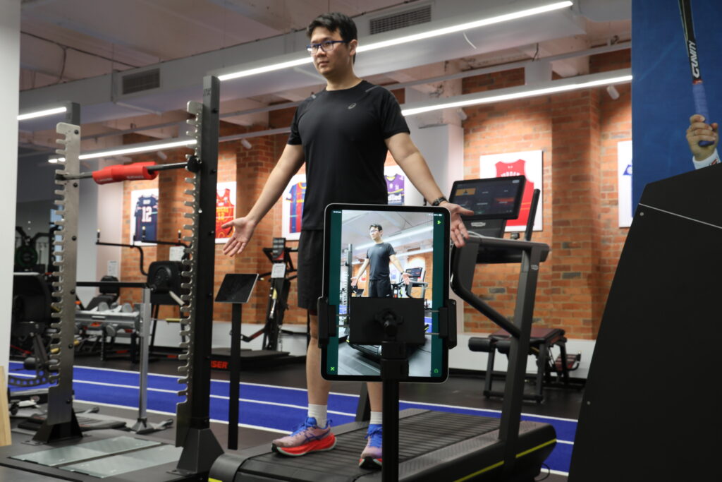 Runner having his posture captured at the start of a running assessment at Melbourne CBD Physiotherapy and Sports Medicine