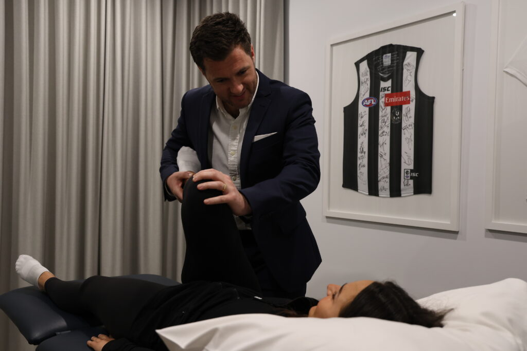 Sports Medicine Doctor Liam West completes a thorough medical assessment in a patient with complex hip pain